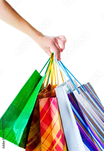 Shopper holding shopping bags