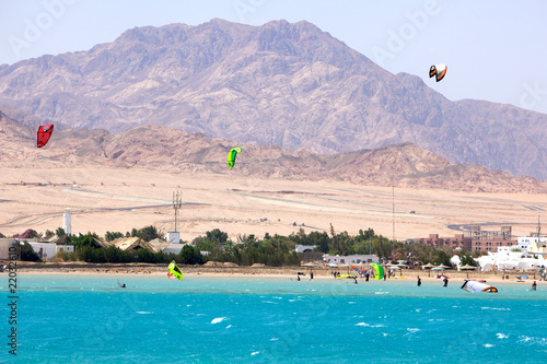 Bild auf Leinwand Kiteboard surfers on the Laguna beach, Dahab