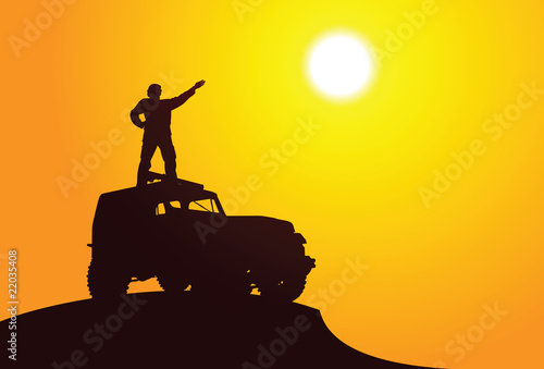Adventure. Silhouette of a man on the car