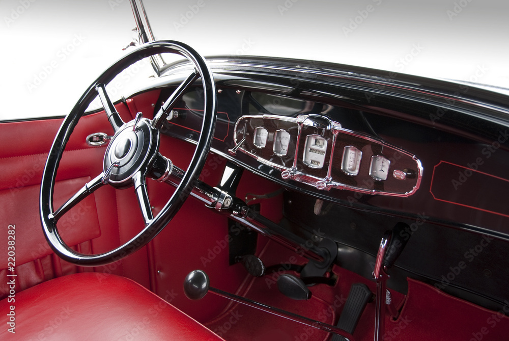 Dashboard and steering wheel from classic 1940ies sedan