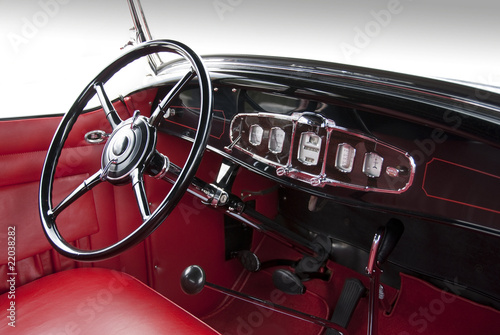 Dashboard and steering wheel from classic 1940ies sedan