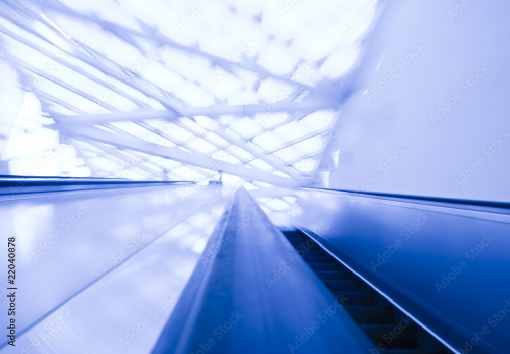 Fototapeta premium Abstract image a moving escalator