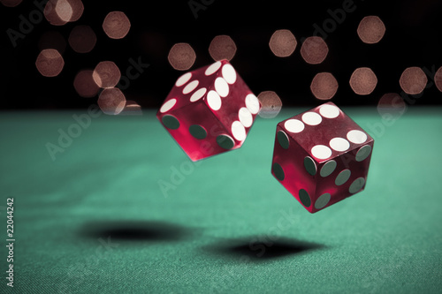 Canvas Print two dice rolling on table