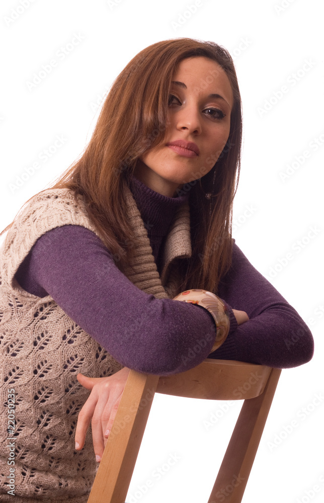 young women sitting on a chair. young women sitting on a chair.