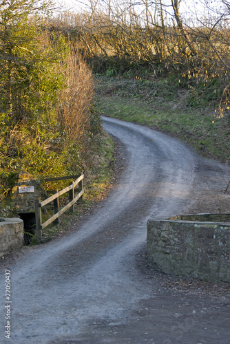 St Swithin's Holy Well on a Country Road near a Cornish Church photo