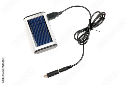 Solar charger for mobile phones isolated on white.