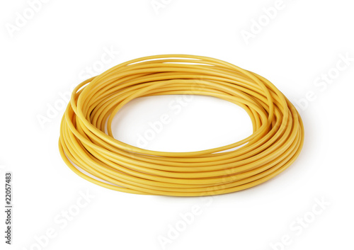 Hank of yellow wire isolated on white background