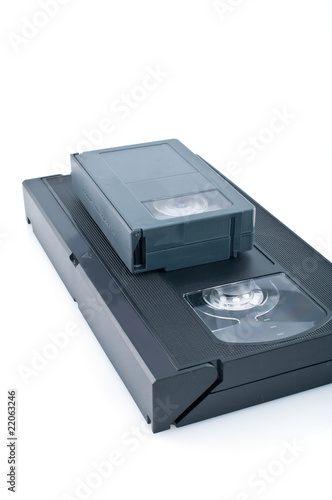 Compact videocassette and VHS