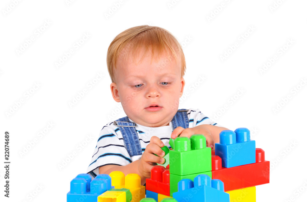 Cute little baby boy with colorful building blocks Cute little baby boy with colorful building blocks