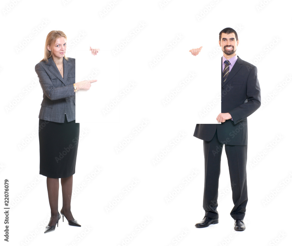 Business couple holding blank sheets of paper Business couple holding blank sheets of paper