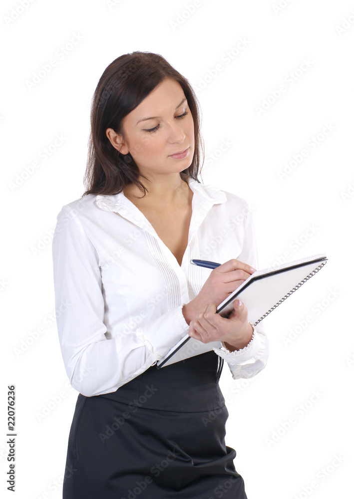 A young and attractive business woman with a notebook A young and attractive business woman with a notebook