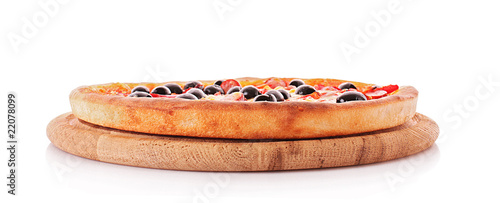 Photography Whole pizza plate isolated on white. Sideview