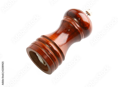 Brown wooden pepper mill isolated on white