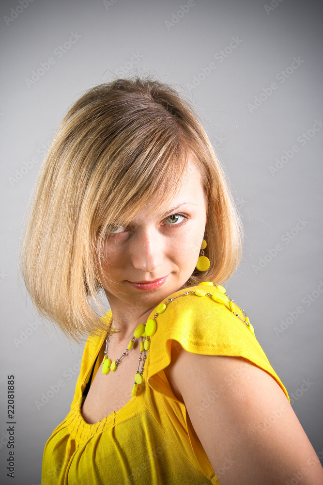 Fototapeta premium portrait of girl in yellow