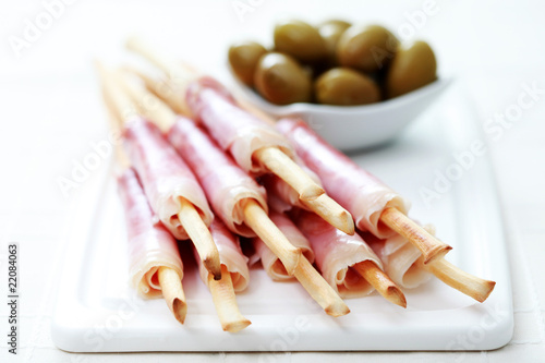 grissini with ham and olives photo