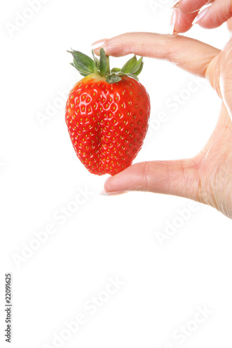 Woman Holding a Strawberry. Model Released
