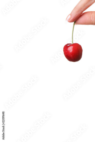 Woman Holding a Cherry. Model Released