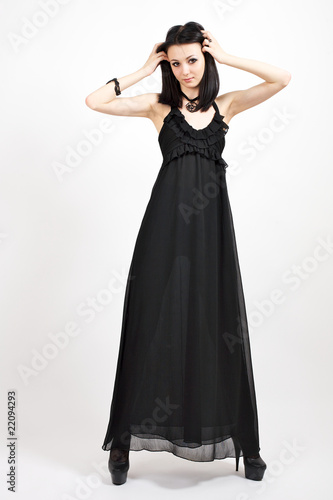 Portrai of young beautyful woman in black dress