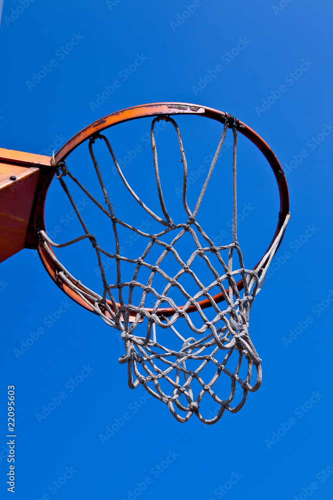 Basketball hoop isolated on blue sky