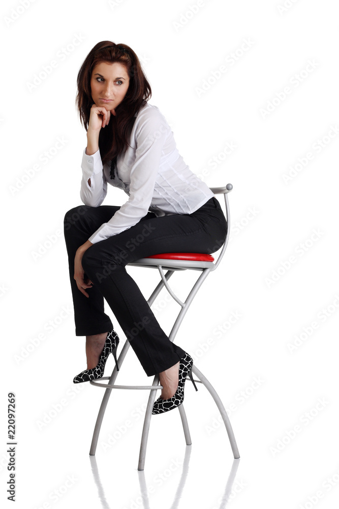 Fototapeta premium Girl sitting on the bar chair