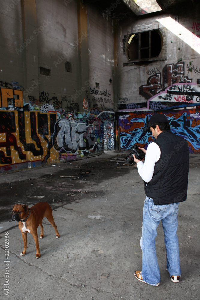 Photographer inside an abandoned building. Photographer inside an abandoned building.