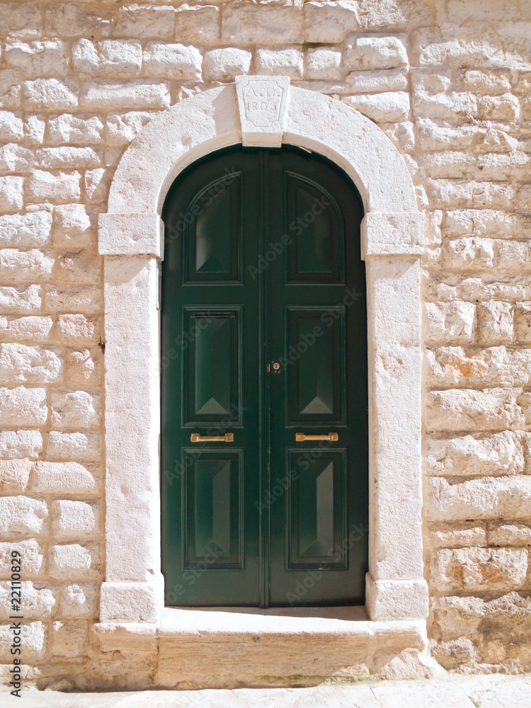 Fototapeta premium Wooden green frontdoor.