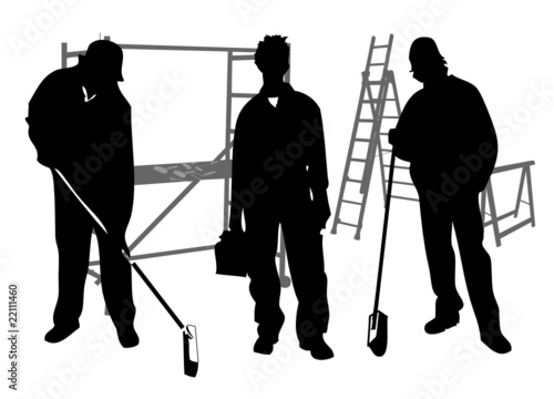 Drei Handwerker auf der Arbeitsstelle