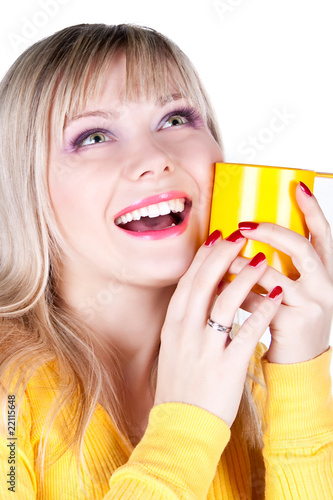 young beautiful blonde girl with cup