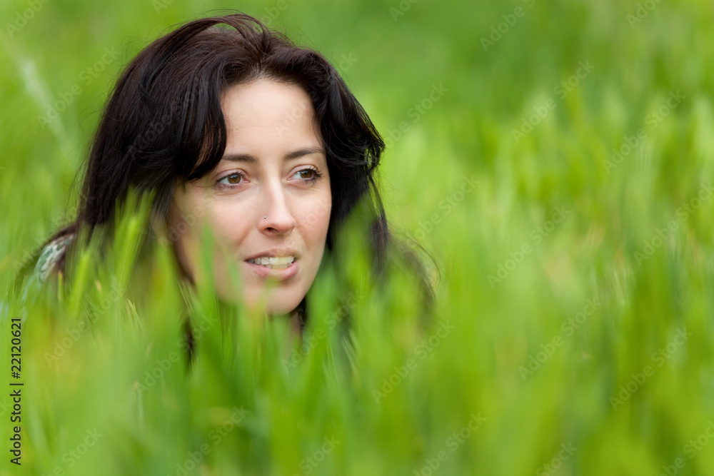 woman portrait in grass woman portrait in grass