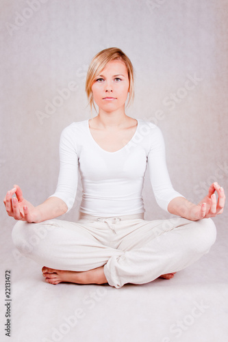 young woman relaxing - on white background