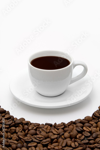White coffee cup and grain on white background