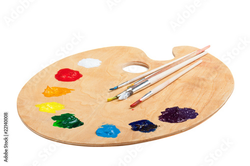 Wooden palette with paint on white