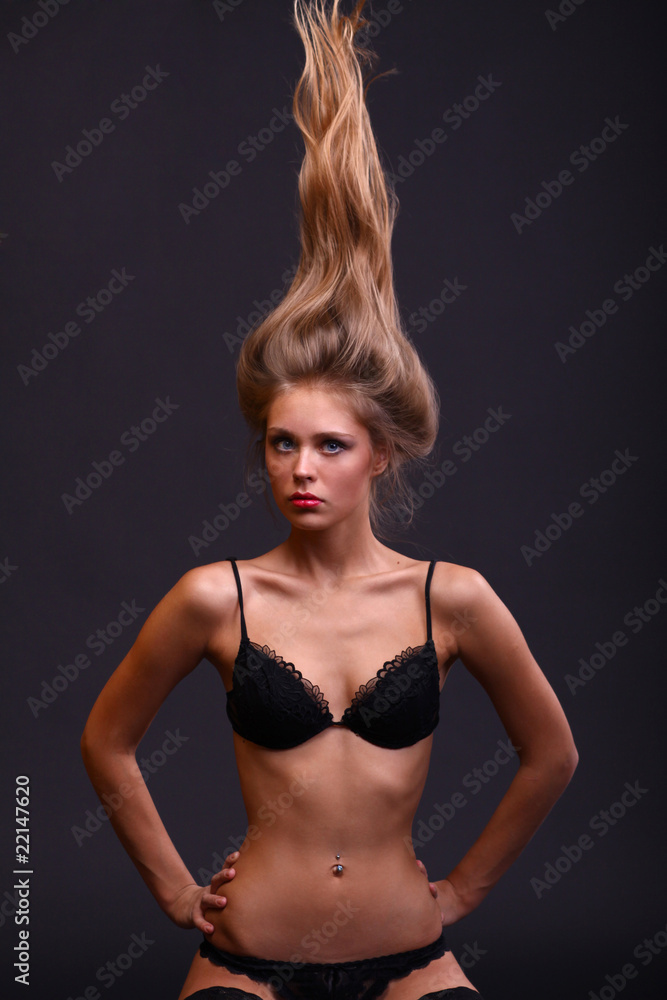 Sexy blonde woman, body on young female in soft light Sexy blonde woman, body on young female in soft light