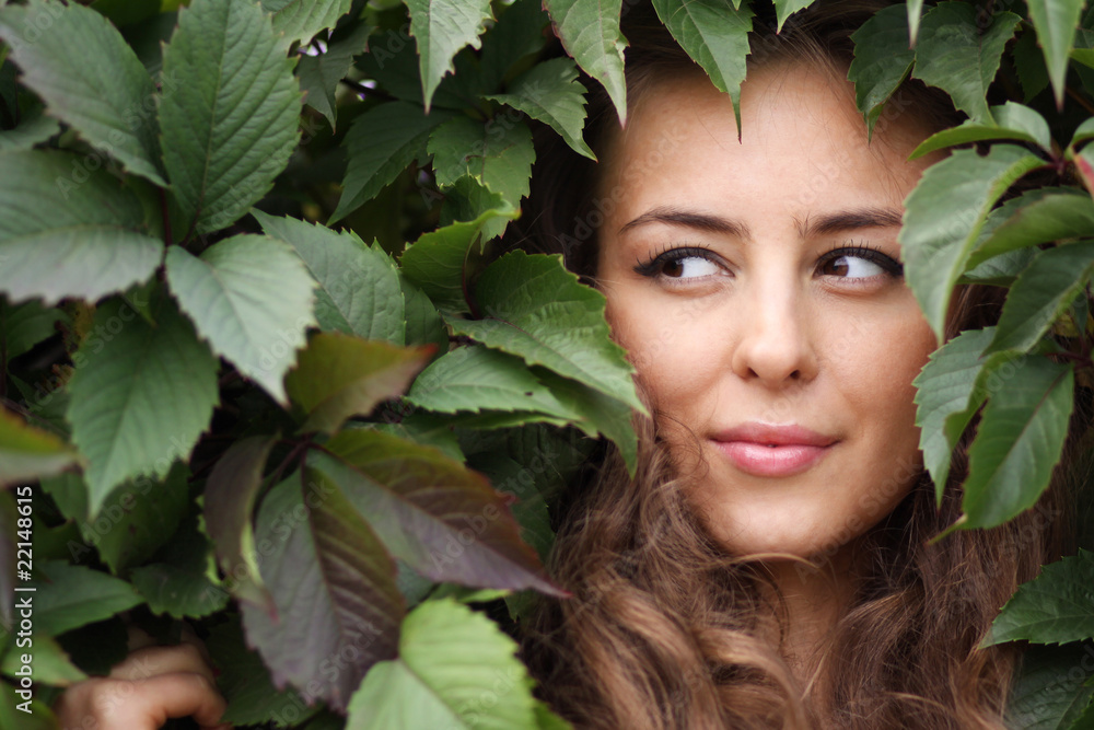 Portrait of the girl in green foliage Portrait of the girl in green foliage