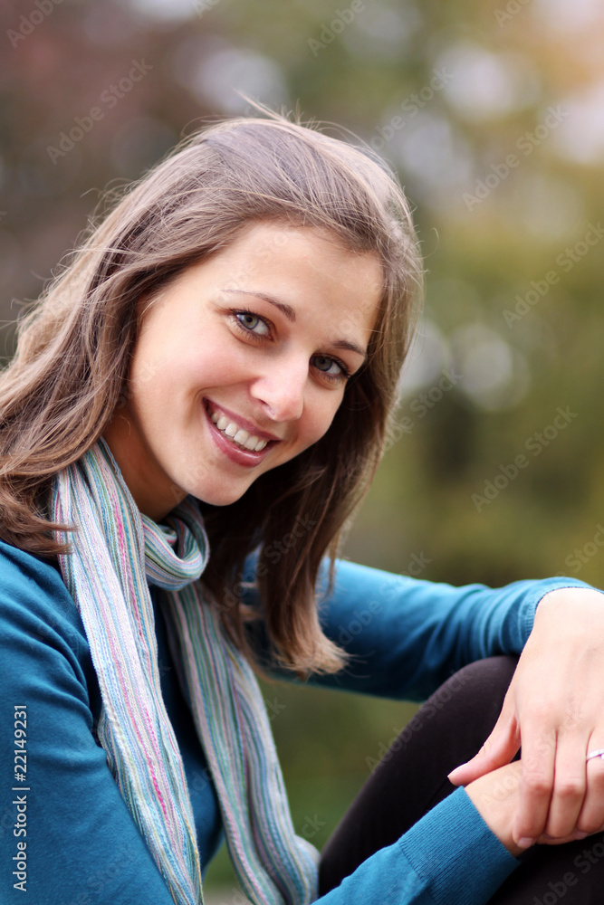 Closeup portrait of a happy young woman smiling Closeup portrait of a happy young woman smiling