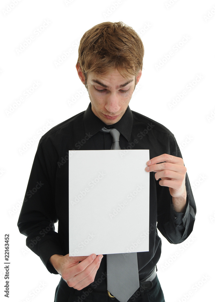 Young man holding blank paper Young man holding blank paper