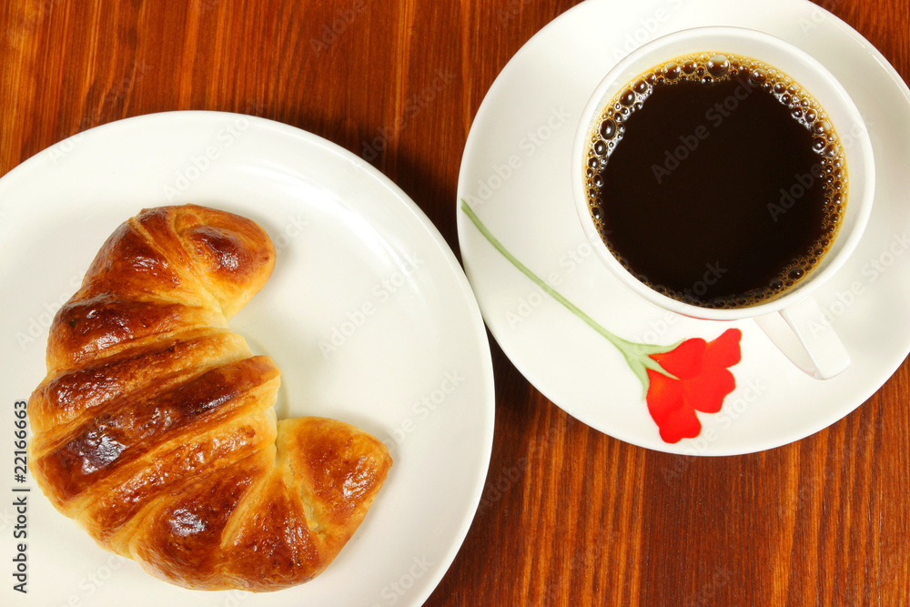 Croissant and coffee Croissant and coffee