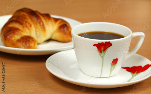 Black coffee and croissant