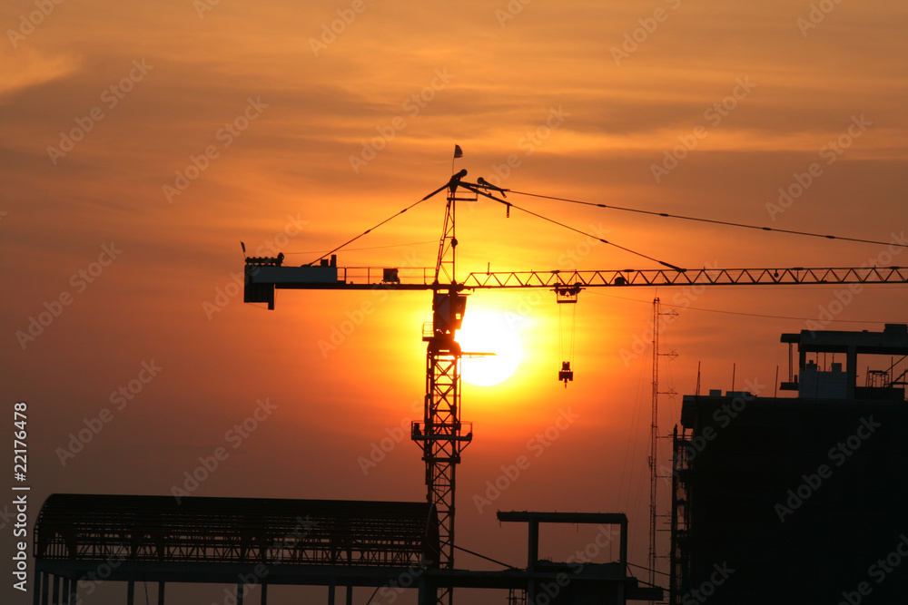 Sunset over a crane, Bangkok, Thailand.