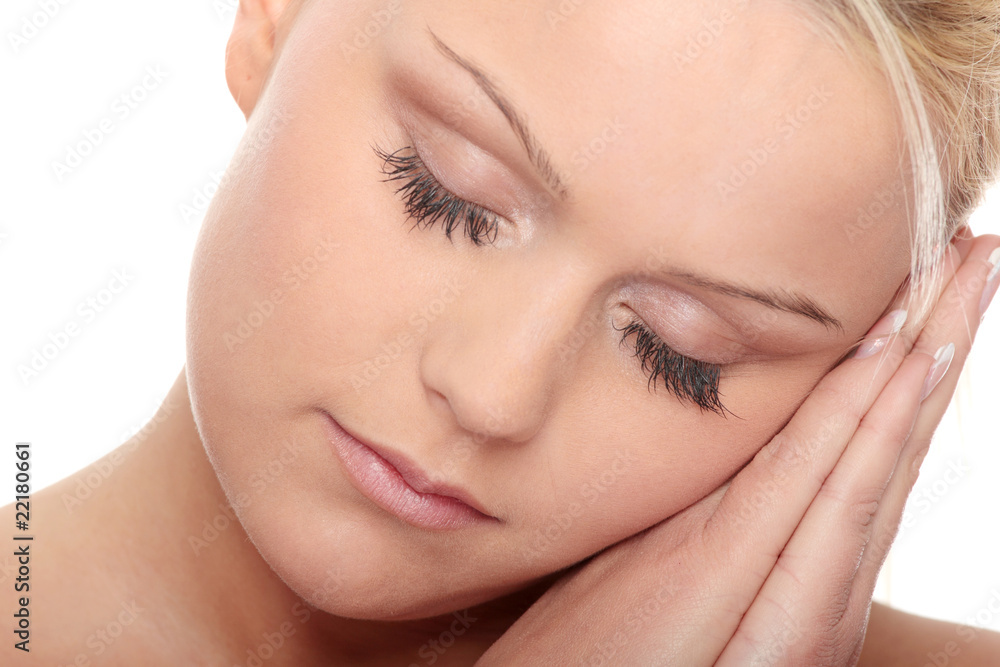 Close-up of beautiful woman face, over white background