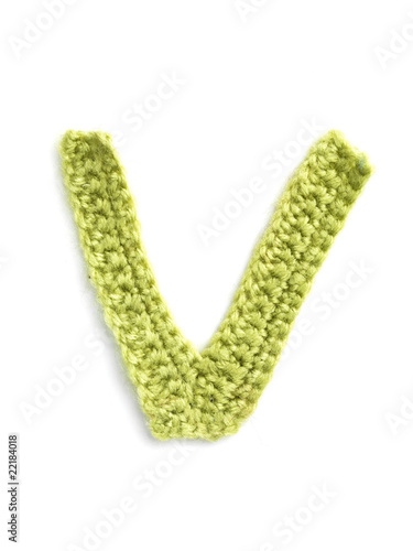 One letter of knit handmade alphabet - V