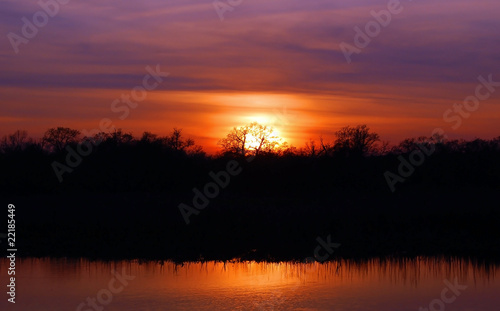 Sunset under forest lake © Unkas Photo