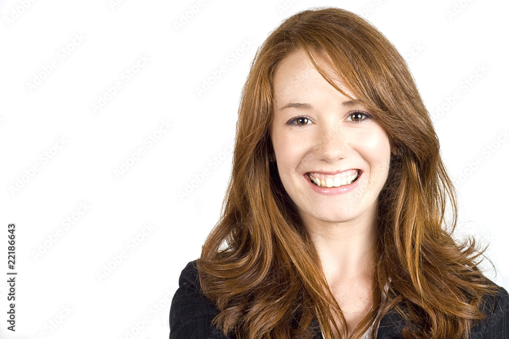 Pretty young woman smiling, dressed in a business suit. Pretty young woman smiling, dressed in a business suit.