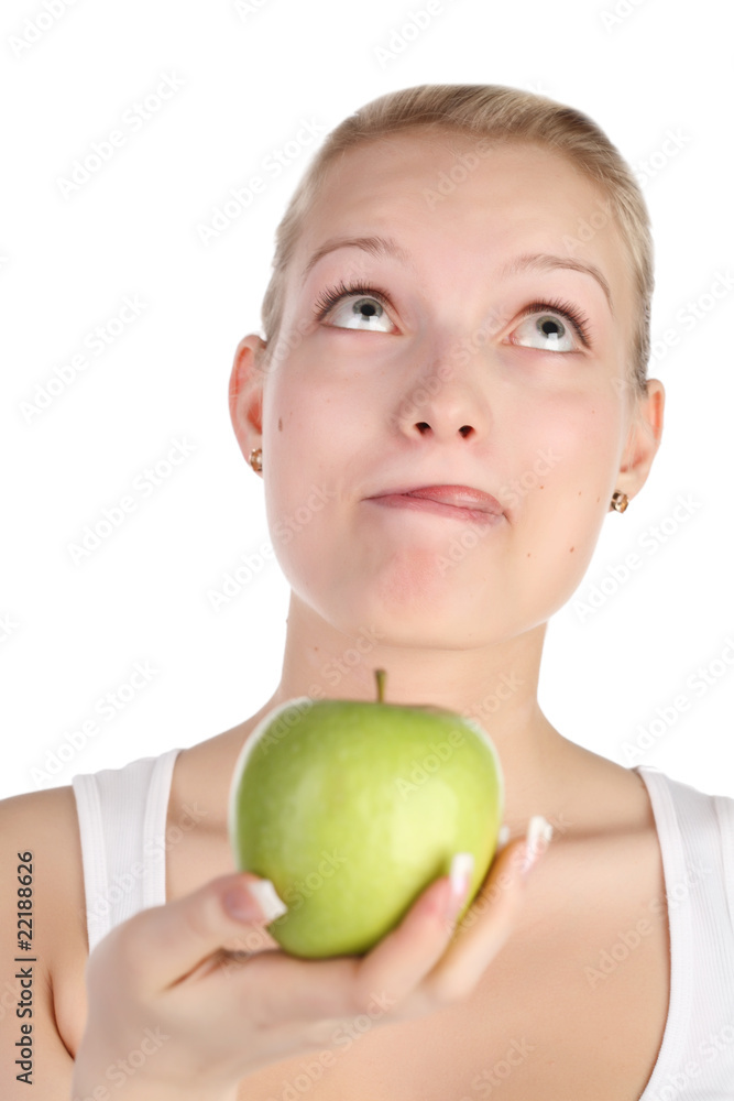 beautiful girl holds green apple and licks lips beautiful girl holds green apple and licks lips