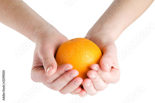 Big orange in hands isolated on white