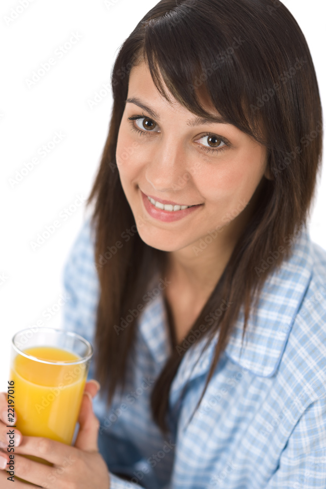 Smiling woman drink orange juice in pajamas Smiling woman drink orange juice in pajamas