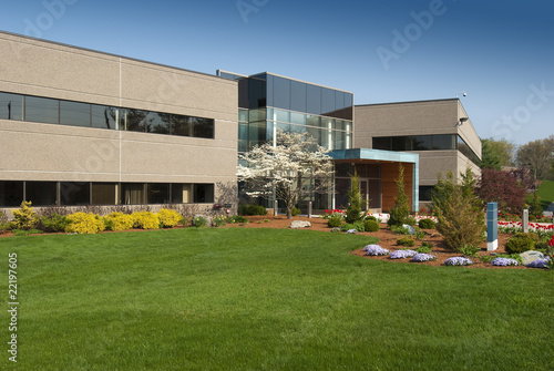 Modern commercial building located in industrial park photo