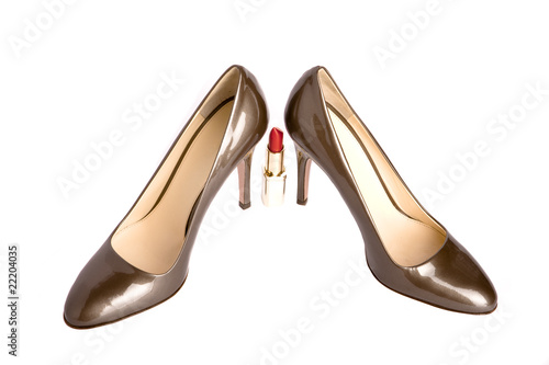 Shoes on a high heel and lipstick