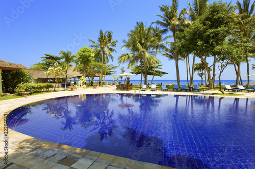 Pool  ocean  palm trees. .Indonesia. Bali..