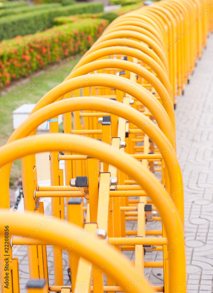 Fence color yellow sidewalk